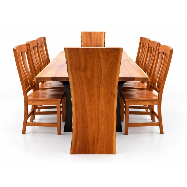 42” x 84” Live edge rustic walnut table with a Craftsman style base Evergreen live edge chairs leather seat x 2 Carolina...