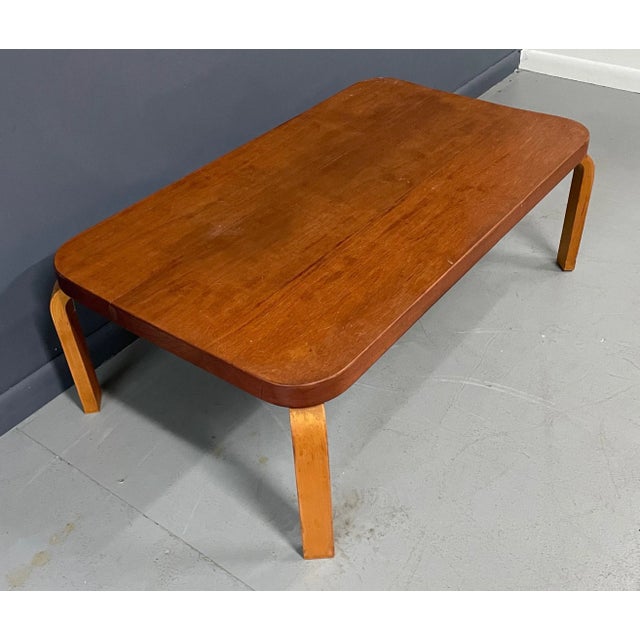 Important piece designed by Alvar Aalto for Artek for the Finnish Pavillion at the 1939 world's Fair. The table retains...