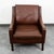 Danish Modern lounge chair in brown leather. Imported directly from Denmark in our most recent shipment. A classic style...