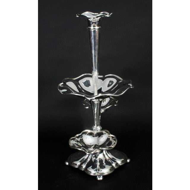 This is a fine quality antique silver-plated victorian centrepiece bearing the maker's stamp to the underside of the...