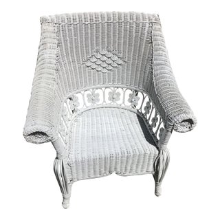 Early 20th Century Heywood Wakefield Style Antique Wicker Rolled Back Wingback Chair For Sale