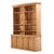 Handsome and architectural, this oak cabinet features an open upper section over a closed lower base. The design is...