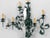 A whimsical French six-light sconce from the 1940s featuring four mirrored bird silhouettes perched on green-painted tole...