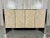 Ello Petite Herringbone design Travertine & Chrome Credenza. dual interior cabinets with adjustable shelf. No label present