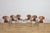 This set of six iconic Model 3101 “Ant” chairs was designed by Arne Jacobsen for the renowned Danish furniture...