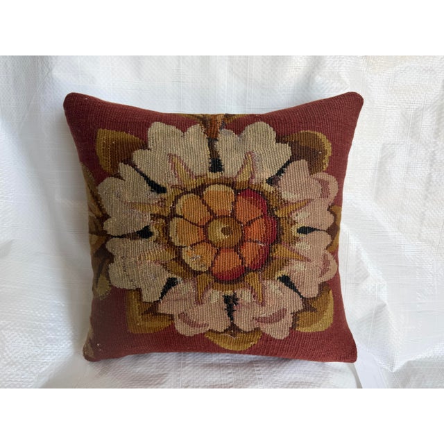 This elegant decorative pillow has been crafted from an authentic 18th century French Aubusson tapestry fragment,...