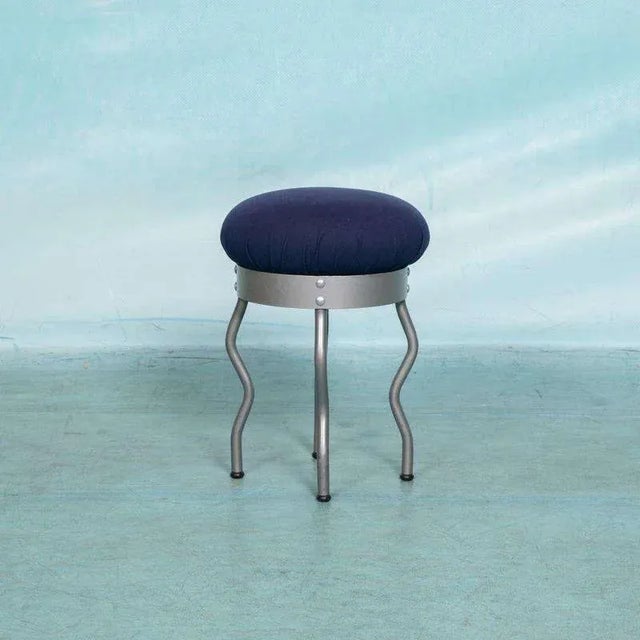 Discover the playfully designed stool 'Uri', designed by Per Ivar for IKEA in the 1990s. This round stool stands out...