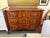 Design Plus Gallery presents a French Provincial Louis XV Style Chest of Drawers from Baker Furniture. The chest has a...