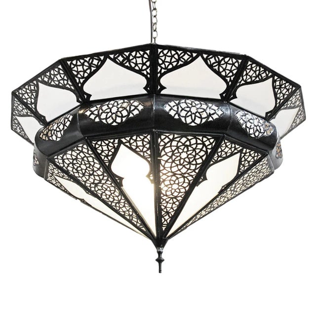 Vintage hand cut metal work chandelier with white frosted glass. Low profile makes this lamp useful for low ceilings. Each...