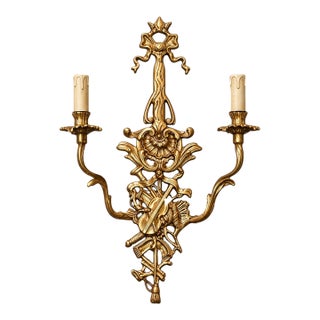 Ornate French-Style Two-Light Wall Sconce – Fully Gilded Gold Leaf With Musical Motif For Sale