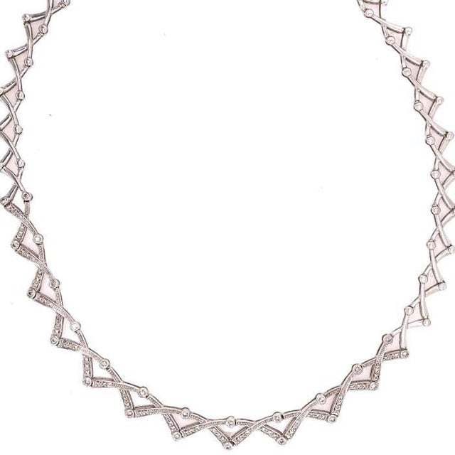 14 Karat Diamond Necklace 18inches and 27.1 grams in weight.