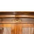 Two-door display cabinet in oak wood covered in mahogany and columns in solid mahogany, fittings and keyholes in mercury-...