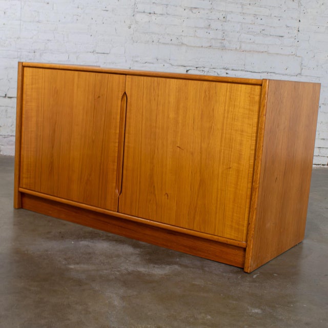 Handsome vintage Scandinavian Modern low profile teak storage cabinet or small buffet or credenza. Beautiful condition,...