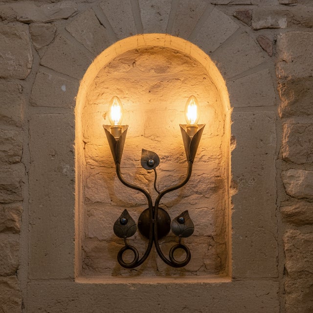 Sapphire Blooms in Iron Elevate your interior lighting to the realm of fantasy and fine art with the Hand Forged Jeweled...