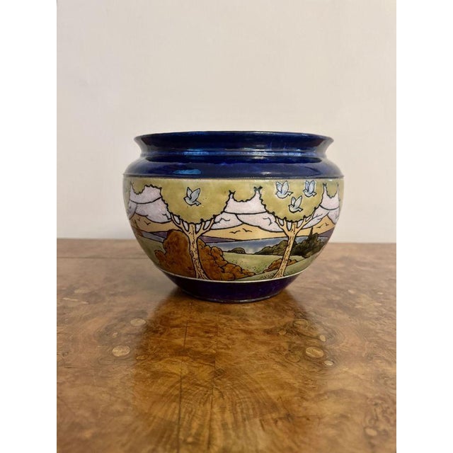 Quality antique Royal Doulton stoneware jardiniere, having a quality antique Royal Doulton jardiniere having a centre...