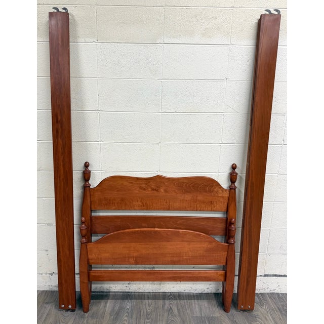 This is a stunning vintage, probably antique, Federal or Empire style twin sized American tiger maple bed. Features shaped...