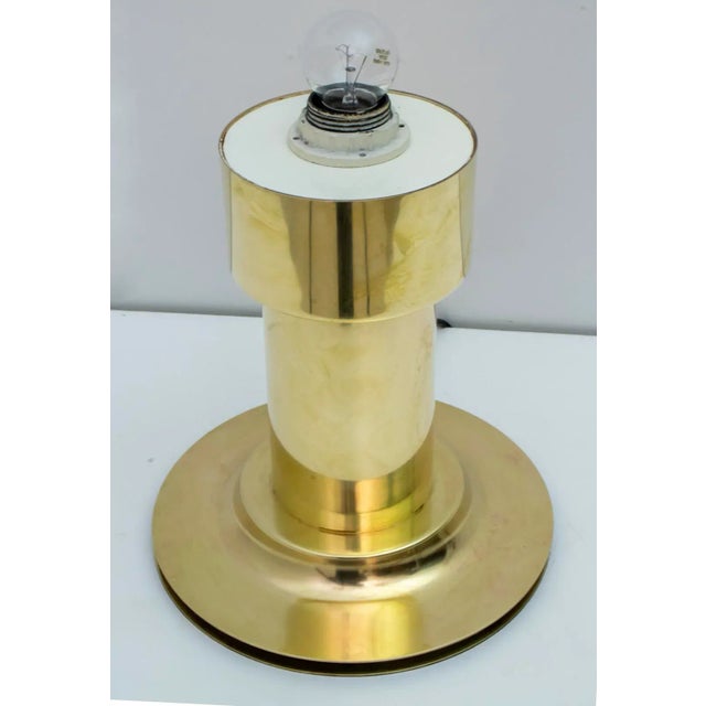This cylindrical table lamp is made of solid brass and of excellent workmanship. European Plug (up to 250V).The wiring of...