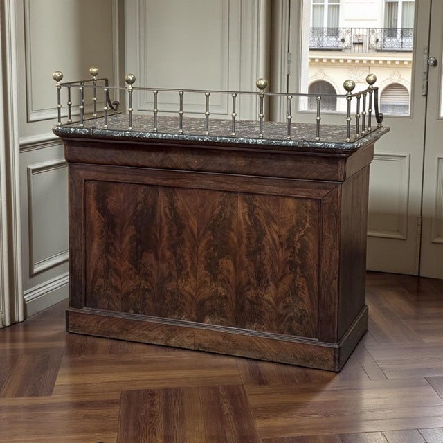Rare and beautifully scaled, this Louis Philippe period marble top concierge counter brings the refined character of mid...