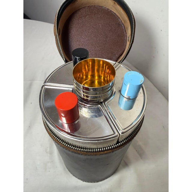 Up for sale is a nice quality vintage German AHS Chrome ART DECO travel flask/shot glass set, featuring a modern style and...