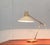 Very rare mid century desk lamp. Probably from Kaiser from the 50s/60s. The lamp convinces with its elegant design...