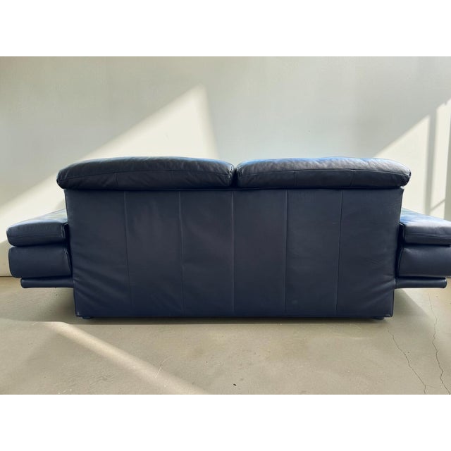 A wonderful, large 3-seater sofa by Rolf Benz, model 6500. Upholstered in black leather, it features a beautiful, sturdy...