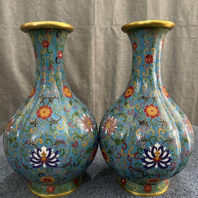 A truly spectacular and commanding find, this listing is for a matching Pair of massive Vintage Cloisonné Enamel Vases....