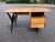 Magnificent desk by Louis Paolozzi Guermonprez edition from the 1950s. Quality finishes: airplane wing top, solid oak...