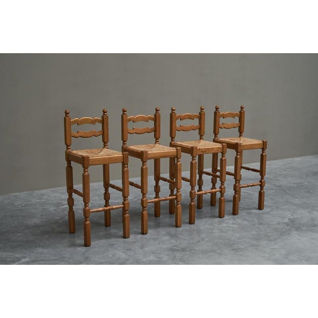 Set of 4 Razorblade Bar Stools in Solid Oak and Rush 1960s This is a wonderful set of unusual mid century bar stools in...