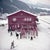 Alpine Railway Station by Toni Frissell Skis stacked up outside and alpine railway station, Klosters, Switzerland, 1951....