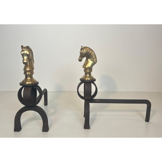 This beautiful pair of decorative andirons is made of wrought iron with finely chiseled bronze horse heads. These andirons...