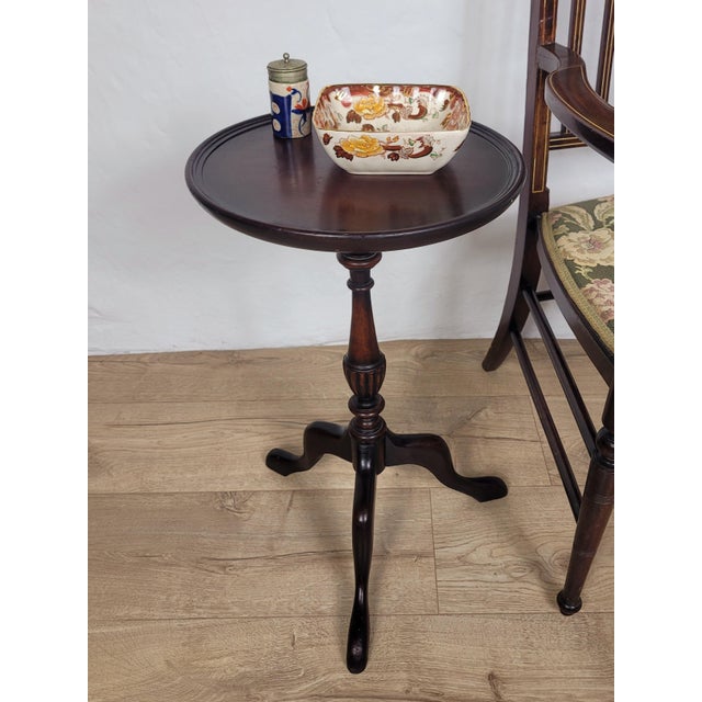 This elegant wine table boasts timeless and classic Victorian features that are sure to complement many country or period...
