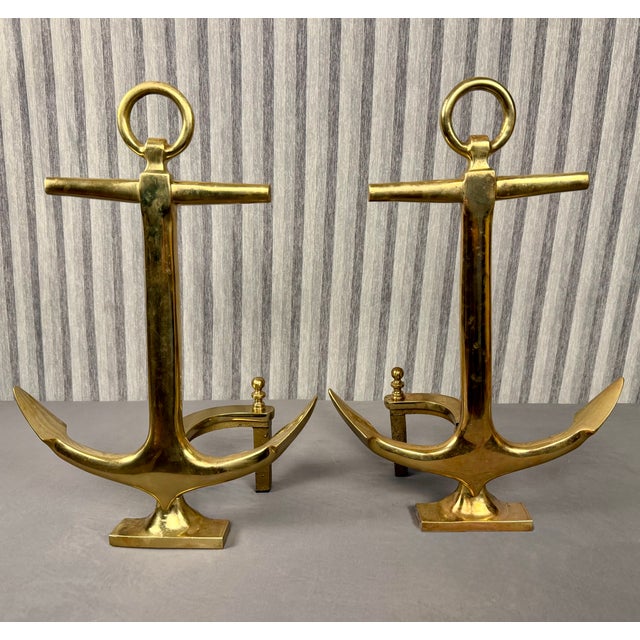 Fabulous pair of Mid-Cantury brass anchor andirons. These have a wonderful antique aged brass patina that could easily be...