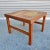 A vintage Danish Modern teak and tile side table with lovely etched designs by Trioh. The table top's tile has an orange...