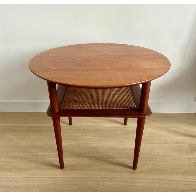 Tiered, teak and cane rattan, coffee end or occasional table designed by Peter Hvidt & Orla Mølgaard for France & Son,...