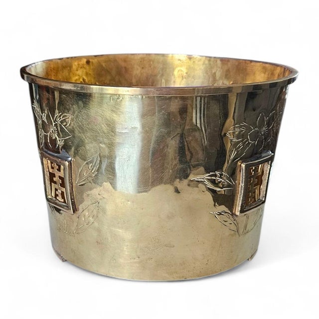 Bring an elegant layer of texture and cultural history to your space with this vintage mid-century Chinese brass planter...