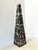 triking carved marble obelisk in dramatic black stone with bold white veining throughout. Crafted from solid marble and...