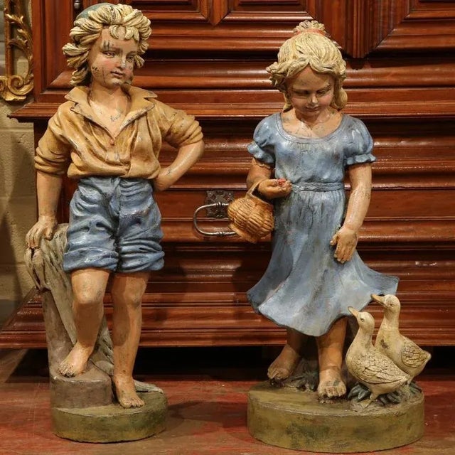Bring a touch of Provençal charm to your home or garden with this delightful pair of antique-style painted iron figures,...