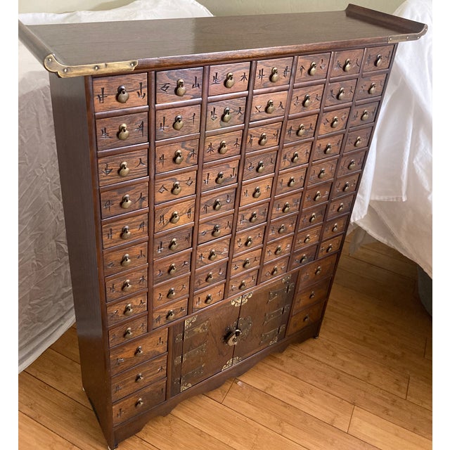 This beautiful vintage Korean Apothecary cabinet was inherited from my late mother, who was a pharmacist and avid fine art...