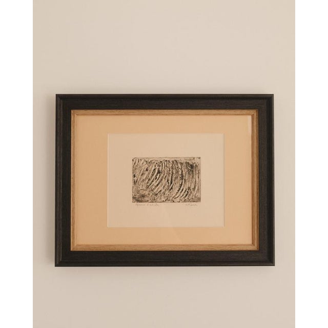 Sweeping black gestures rush across a field of white in this untitled etching, creating an arresting rhythm of light and...