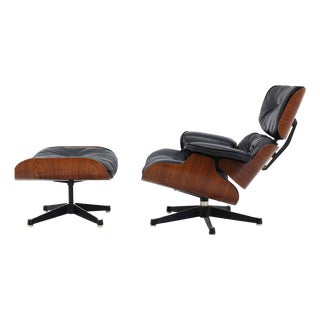 Set of Model 670 Lounge Chair and Ottoman in Rosewood and Black Leather by Charles & Ray Eames for Herman Miller, USA, 1956 For Sale