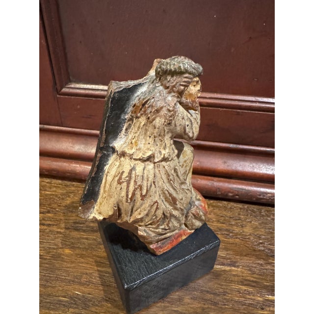 I typically see santos sculptures made of carved wood, so I was surprised when I realized I had one made of pottery! It...