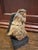 I typically see santos sculptures made of carved wood, so I was surprised when I realized I had one made of pottery! It...
