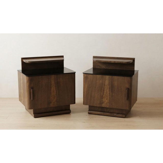 A rare pair of vintage nightstands designed by jindřich halabala for up závody in czechoslovakia during the 1940s. The...