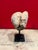 Beautiful fossil of shell petrified to stone on black metal stand. Original color. Architectural and one of a kind.