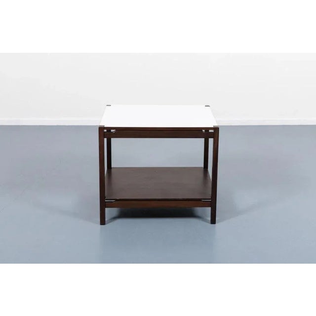 Beautiful Vintage Italian side table/coffee table from Hirozi Fukuoh for Gavina. Executed in varnished walnut, equipped...