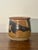 This vintage studio pottery vessel dates to November 1994 and reflects a thoughtful balance of weight, tactility, and...