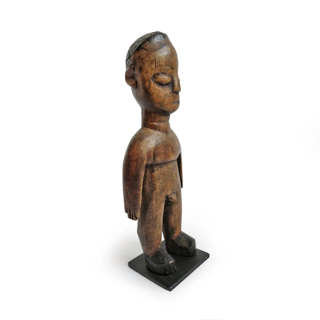 Hand carved old Ewe Doll from Togo, Africa. These dolls are also called ”venavi “, a small wood doll that was usually...