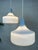 Two vintage opaline pendant lamps. Pastel blue. Attractive shape. In good condition. One has a small, inconspicuous chip...