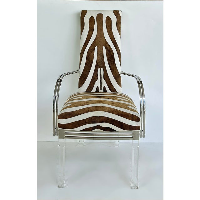 Vintage Lucite, Chrome Armchairs Upholstered in Zebra Cowhide, Pair Offered for sale is a pair of vintage mid-century...
