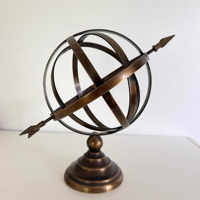 Vintage brass armillary sphere with arrow, nautical maritime astrolabe globe. Great for desk decor. Heavy, beautiful...